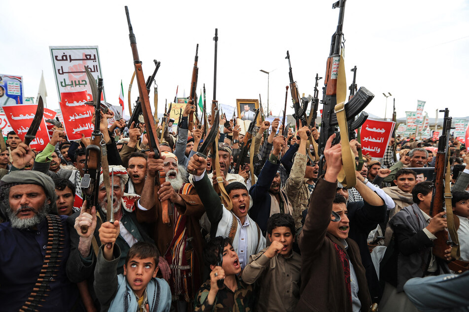 Armed Yemeni supporters of the Houthi movement protest against restrictions imposed by Saudi Arabia on separatist regions of Yemen.