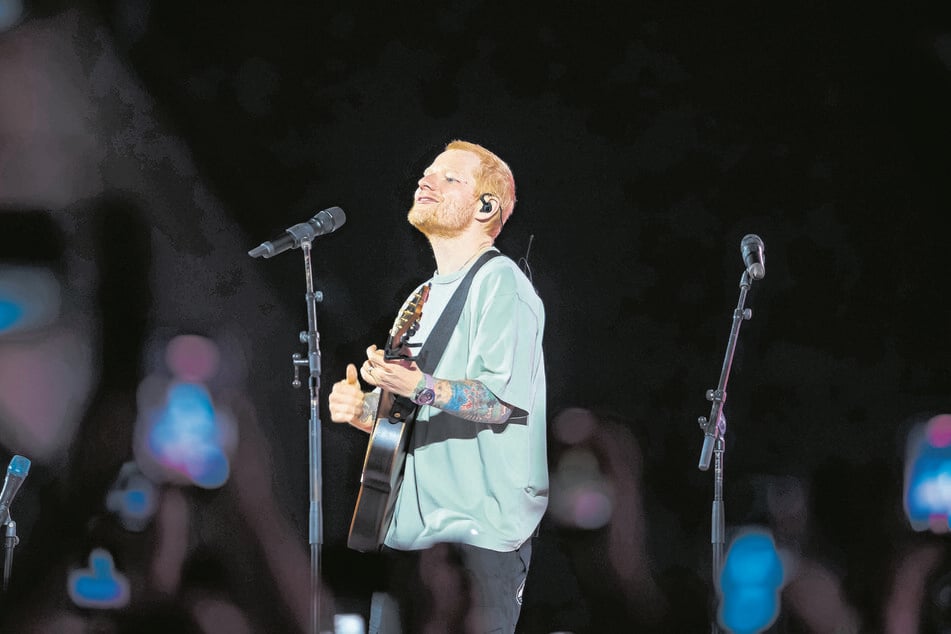 Ed Sheeran performs onstage. During his Atlanta concert, Ed Sheeran responded to his cousin Jethro calling him a "selfish" individual following the fallout with Macklemore.