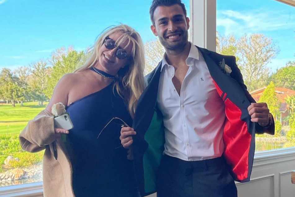 Britney Spears (r) and Sam Ashgari wed in 2022 following the end of the pop star's nearly 14-year conservatorship.