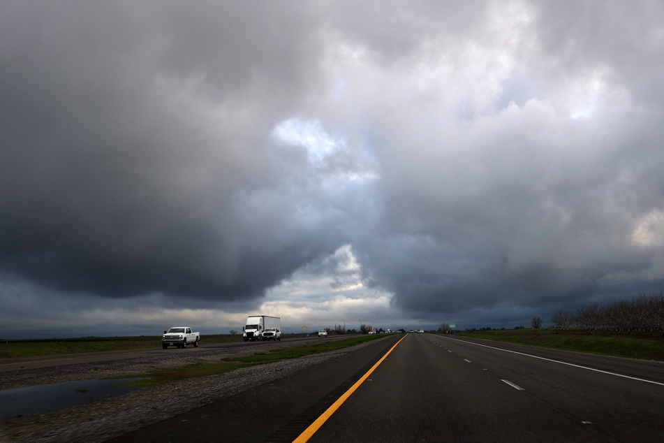 California officials warned Tuesday of potential flooding and travel delays as a severe storm rolls into the state.