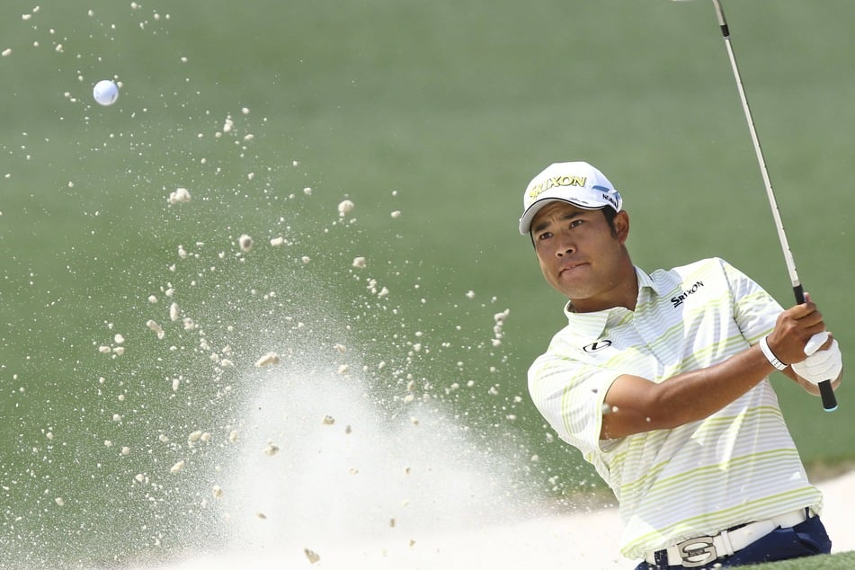 Golf: Hideki Matsuyama makes history with his first green jacket at the Masters