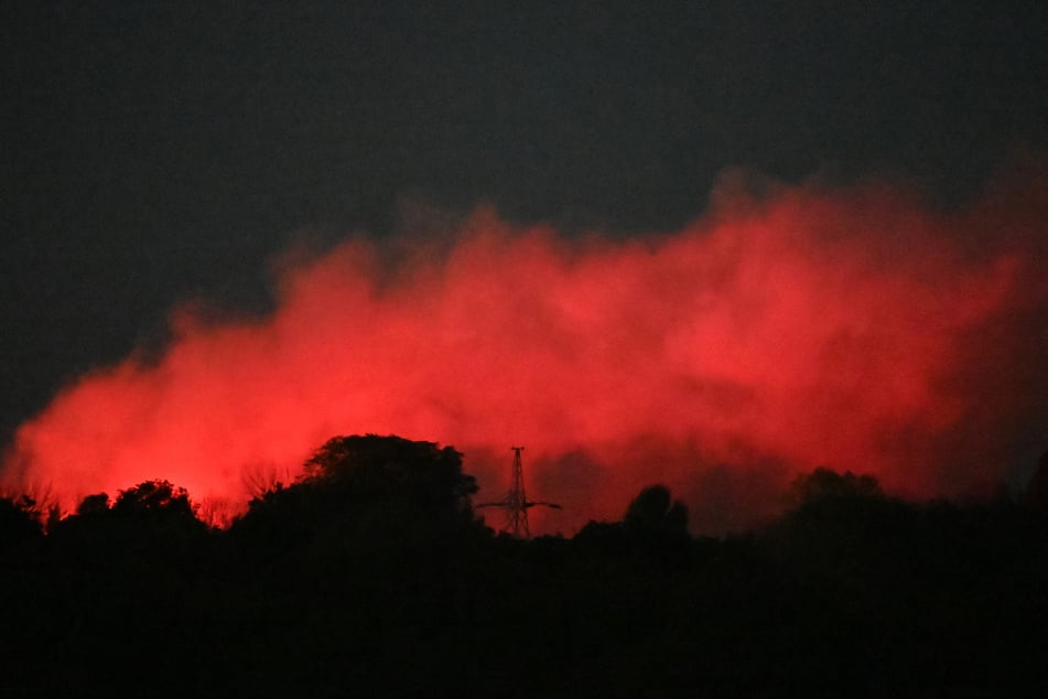 A fire erupts during an air strike on Kyiv late on September 26, 2026, amid the Russian invasion of Ukraine.