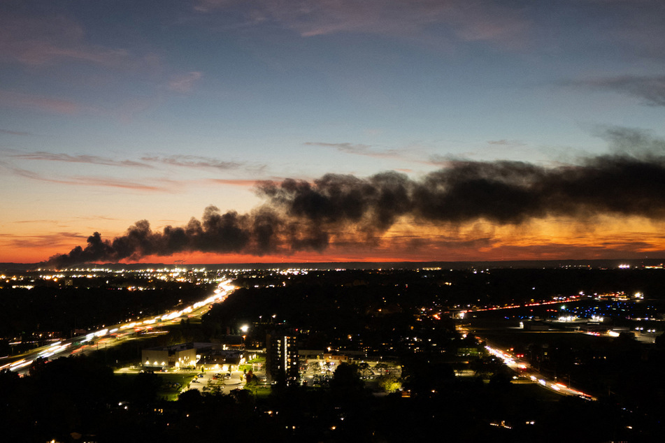 Smoke rises from the site of a UPS cargo plane crash near the UPS Worldport facility in Louisville, Kentucky, on November 4, 2025.