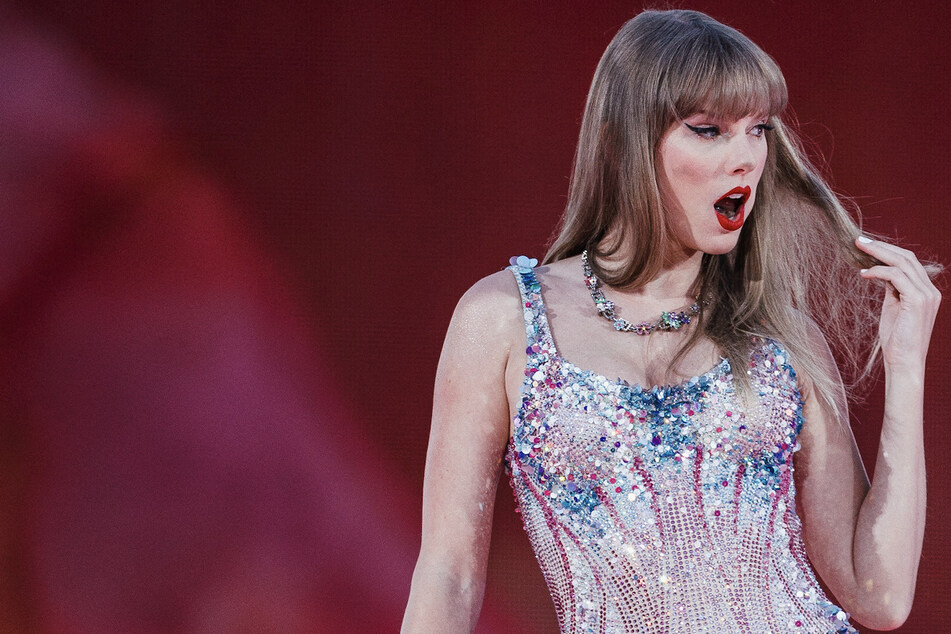Travis Kelce is asked when he'll "make an honest woman" out of Taylor Swift in SNL skit