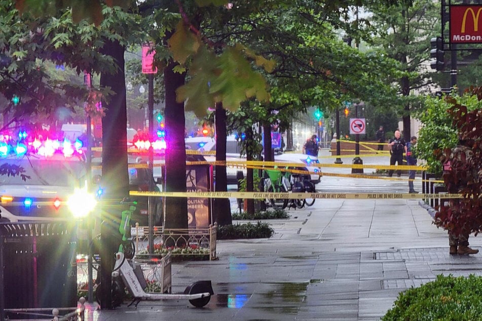 Police tape blocks off a sidewalk near the White House in Washington, DC, on Saturday.