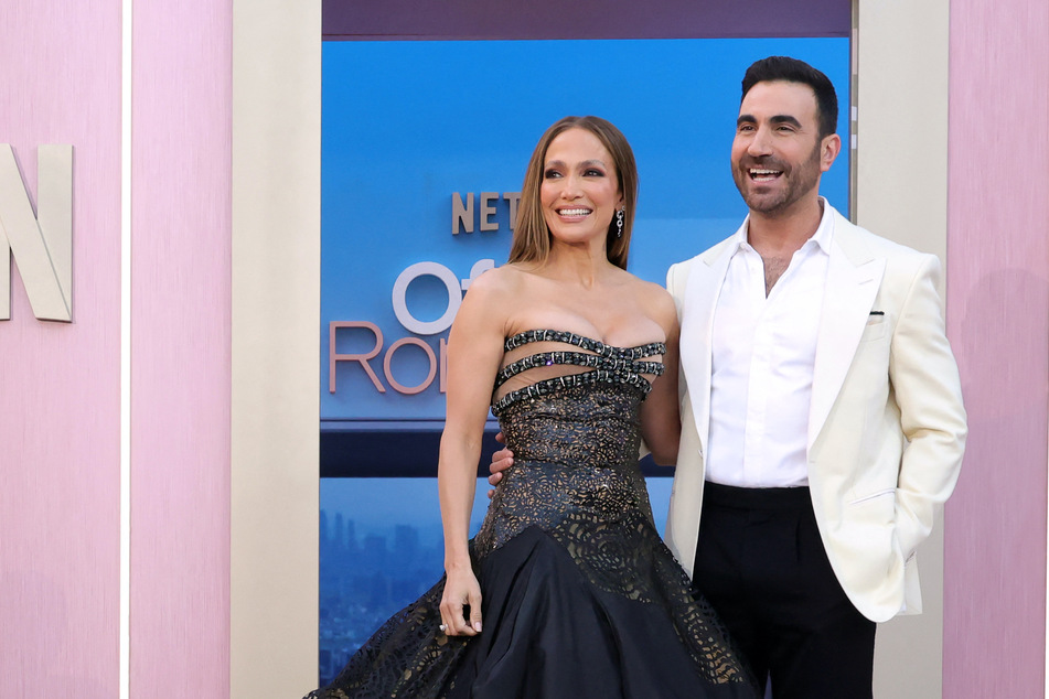 Jennifer Lopez couldn't help but gush over her Office Romance co-star, Brett Goldstein (r).