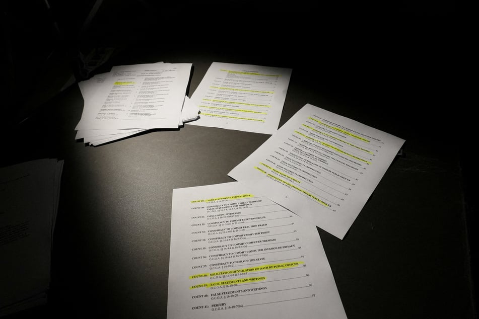 The indictment features charges filed under the RICO Act, which are typically brought against mobsters.