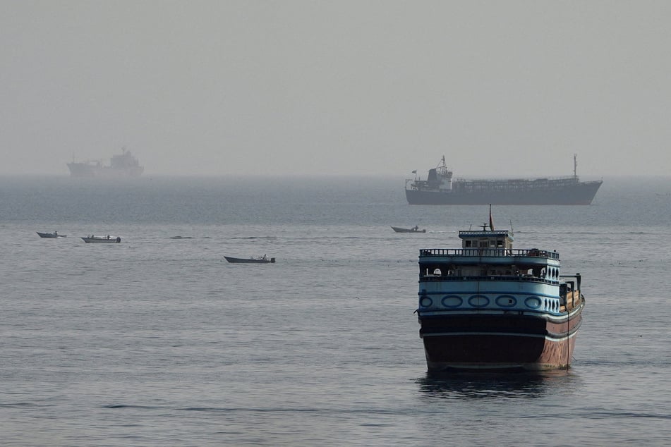 Vessels are pictured in the Strait of Hormuz, as seen from Musandam, Oman, on August 3, 2026.