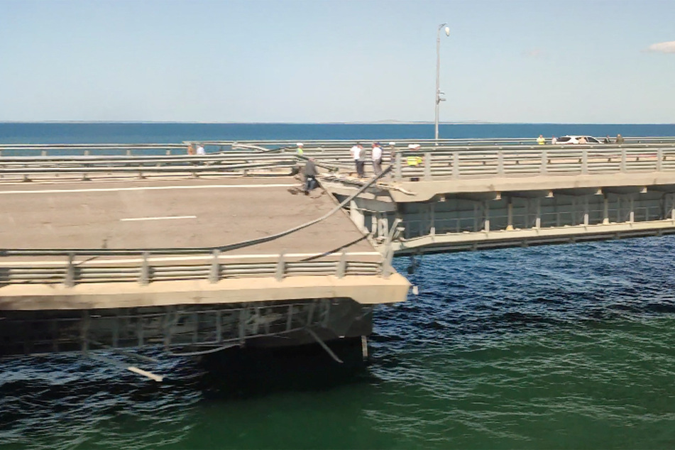 A Ukrainian attack on the annexed Crimean peninsula damaged the bridge that acts as a key supply line for Russian forces.