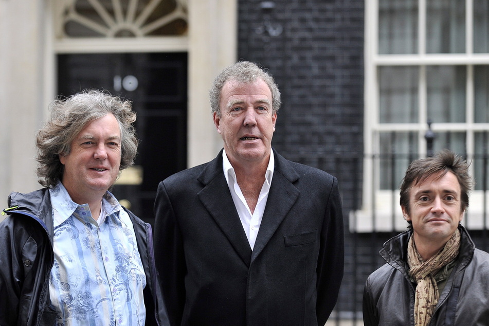 Jeremy Clarkson (c.) pictured alongside his Top Gear co‑hosts James May (l.) and Richard Hammond.