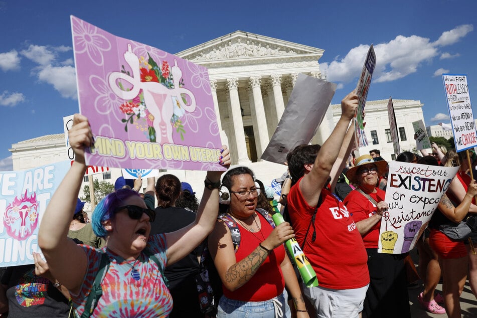 Abortion rights advocates participate in a protest outside the US Supreme Court Building on Monday in Washington, DC.