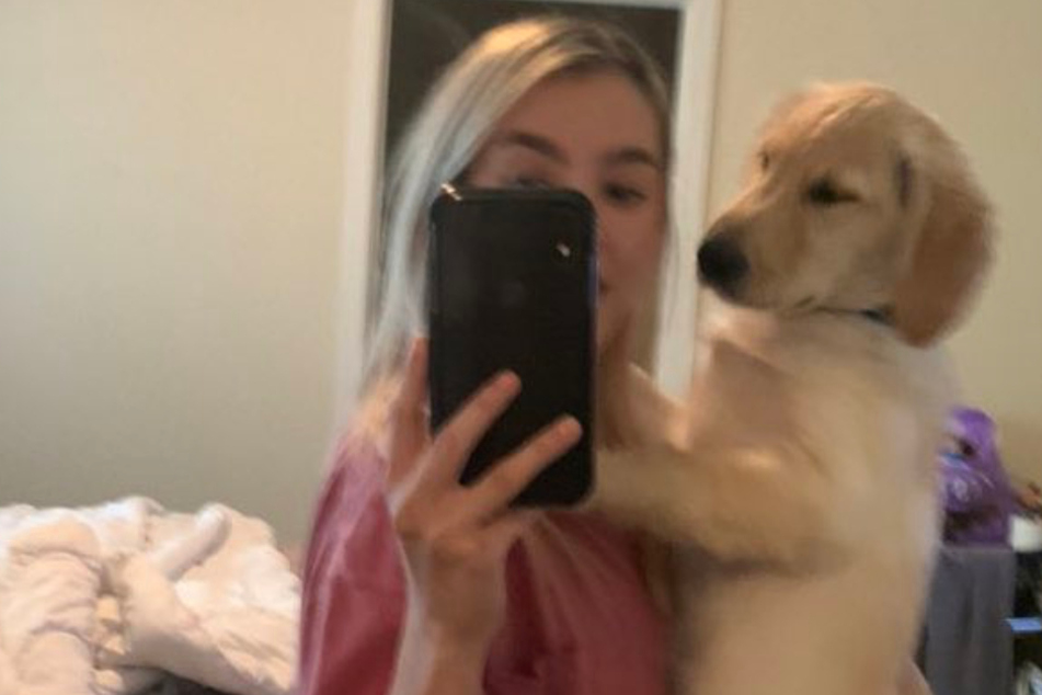 Woman notices hilarious detail after taking selfie with her cheeky puppy