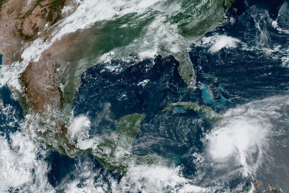 Hurricane Beryl approaches Jamaica in a composite satellite image over the Caribbean Sea.