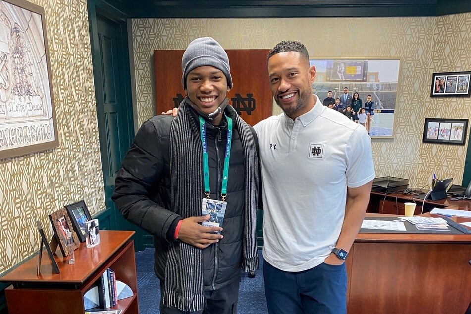 Notre Dame commit Christian Gray (l.) and head coach Marcus Freeman.