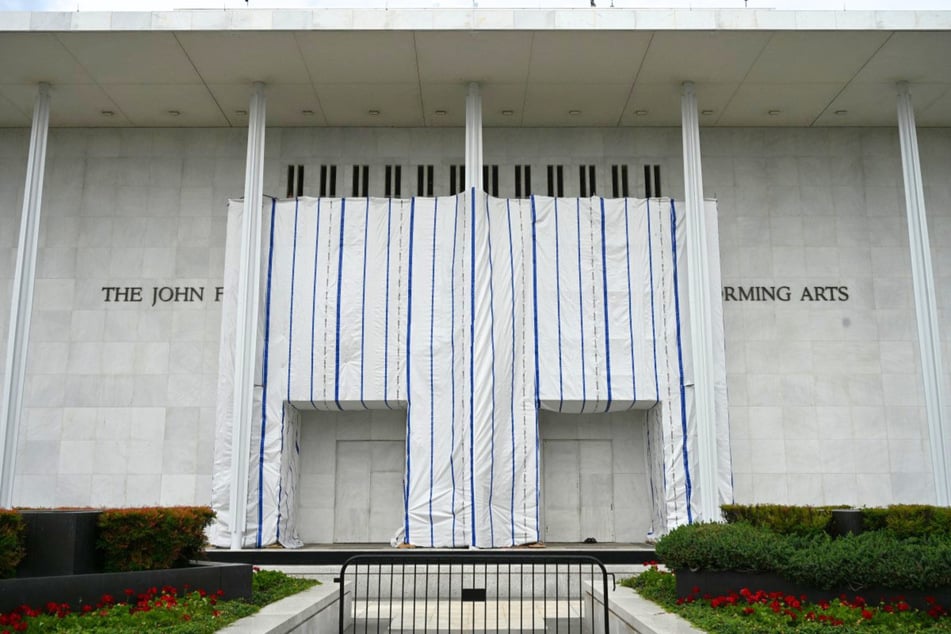Members of President Donald Trump's Kennedy Center board claimed they are blocking the building with a tarp-covered scaffolding while they perform repairs.