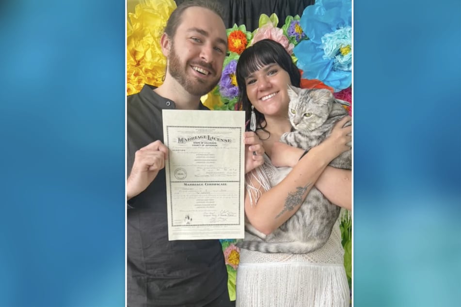 The perfect paw print was practiced several times before it was placed on the official wedding certificate.