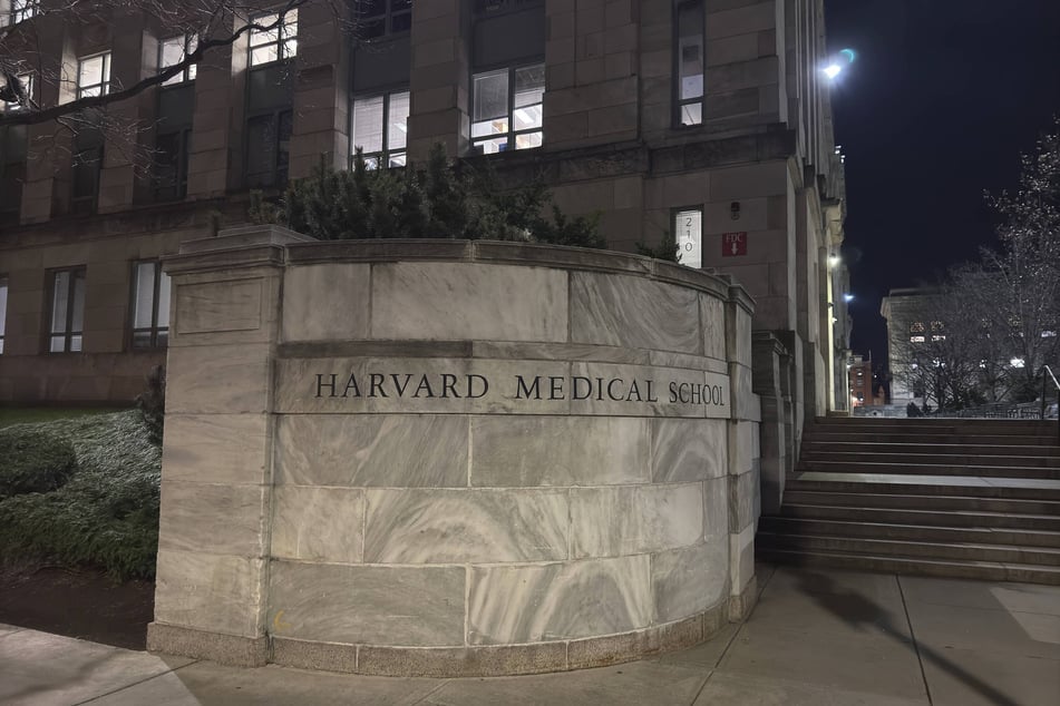 A former morgue manager at Harvard Medical School was sentenced to eight years in prison for trafficking stolen remains.