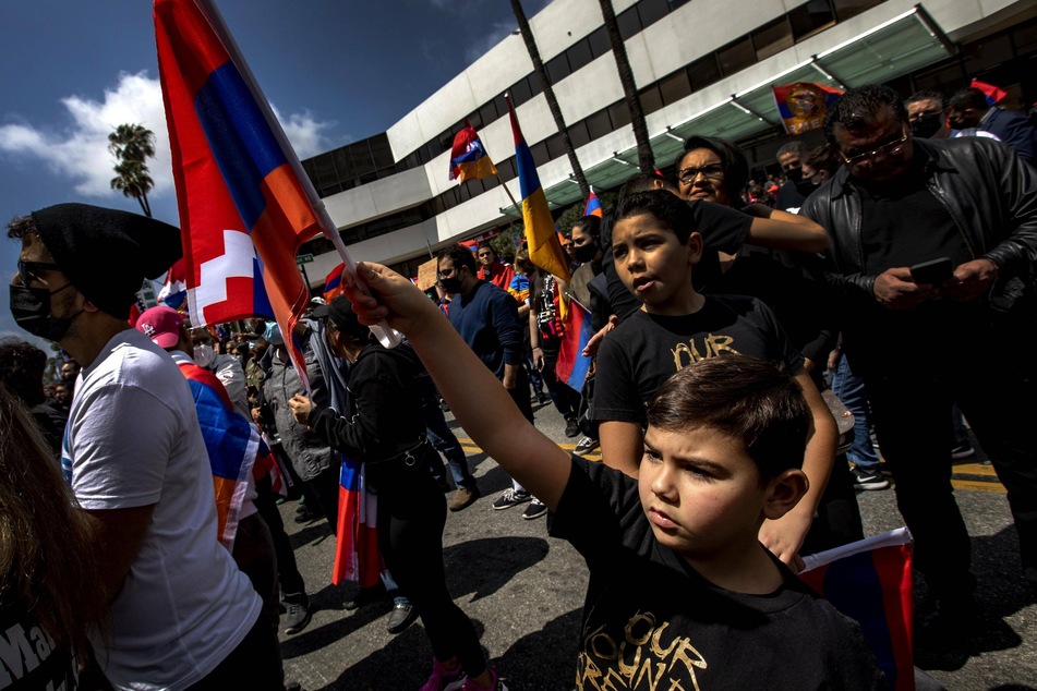 Hundreds of people from the Armenian community gathered outside the Turkish embassy in Beverly Hills in remembrance of the Armenian Genocide of 1915