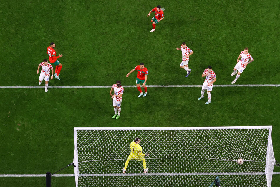 Morocco's Youssef En-Nesyri heads at goal against Croatia at the 2022 World Cup in Qatar on Saturday.