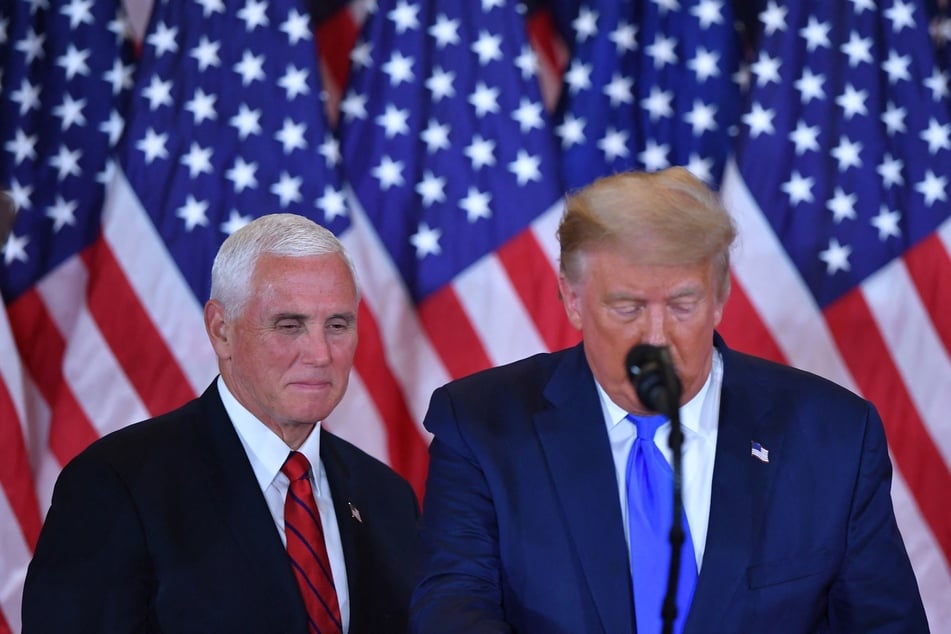 Former Vice President Mike Pence (l) was confronted by former President Donald Trump numerous times before the January 6 attack on the US Capitol.