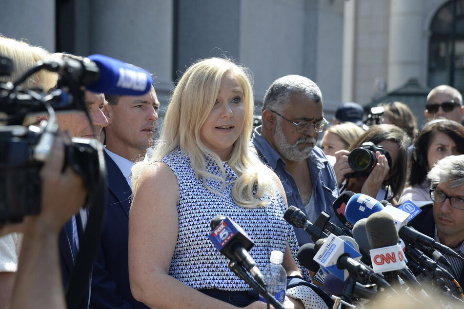 Virginia Roberts Giuffre speaking to reporters in New York in 2019.