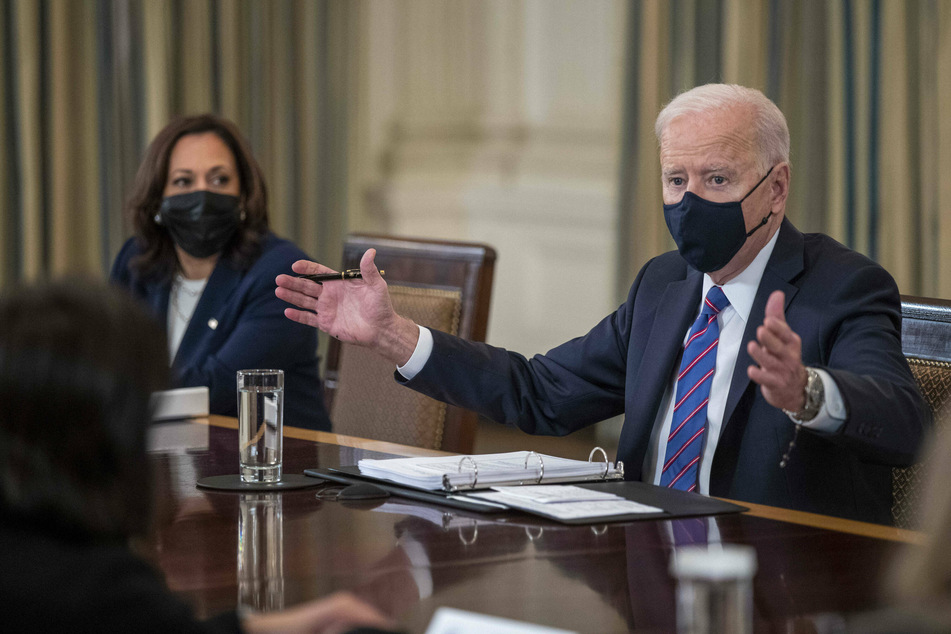 President Joe Biden, with Vice President Kamala Harris, delivers remarks in a meeting to address the situation at the US border.