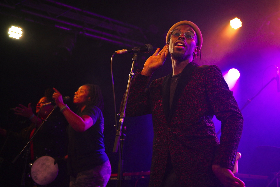 Singer-songwriter Eric Burton's group Black Pumas is nominated for the AMA Band of the Year award.