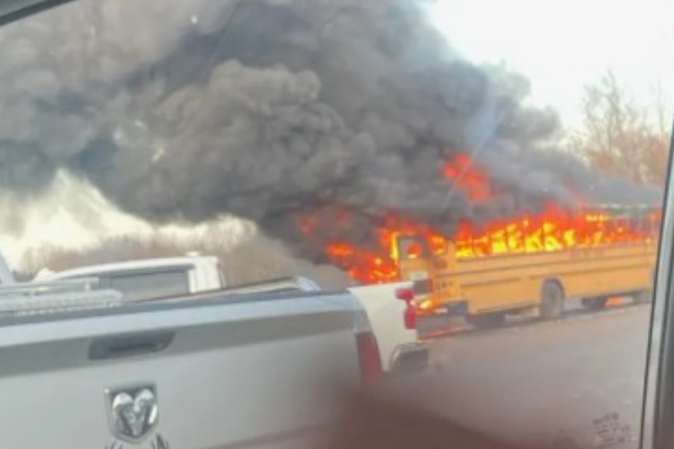 School bus goes up in flames as brave first-grader comes to the rescue