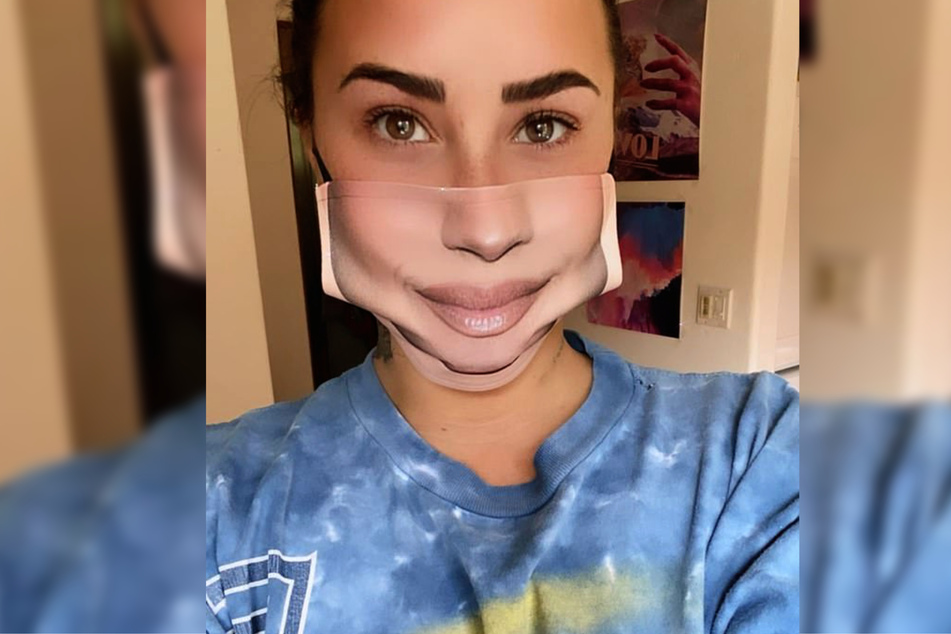 Demi Lovato's new mask doesn't hide her smile.