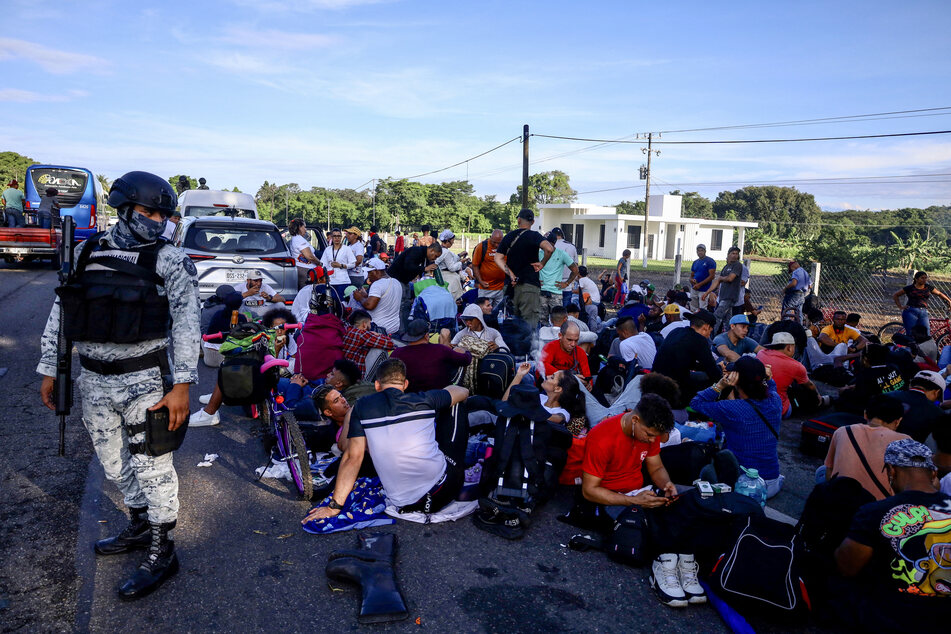 Refugees in Mexico march in protest against new restrictions introduced under US pressure