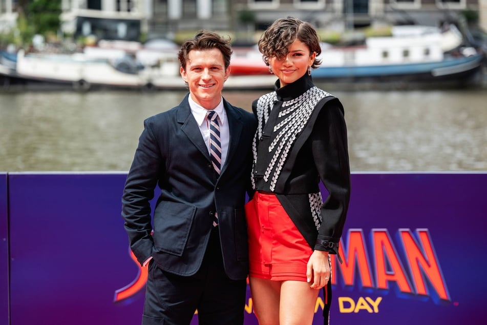 Zendaya and Tom Holland (l) held a private celebration for their wedding in the UK with their closest loved ones earlier this week.