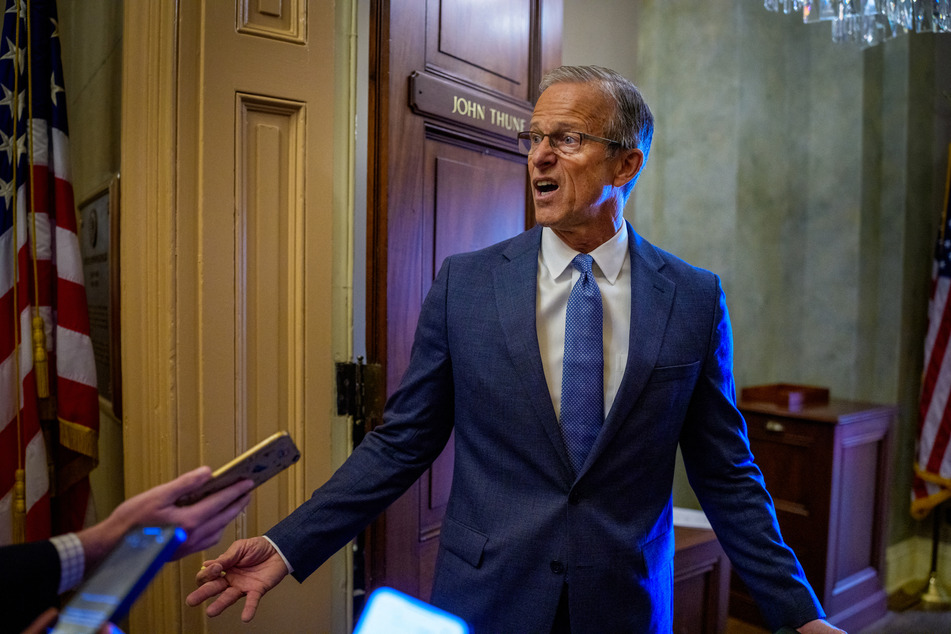 Senate Majority Leader John Thune (R-SD) speaks to reporters as he returns to his office from the Senate Chamber at the US Capitol Building on Monday in Washington, DC.