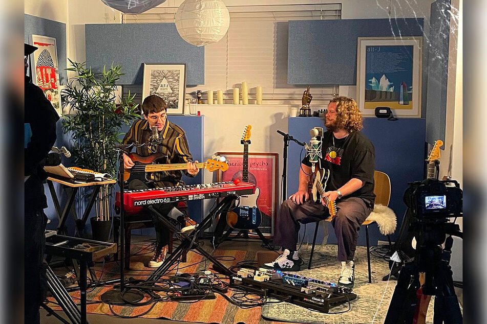 The indie rockers hard at work.