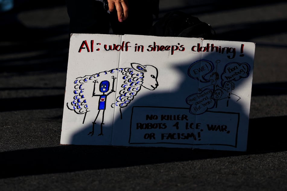 Anti-AI protesters gather outside an OpenAI developers conference at Fort Mason on September 29. After recent security scares, concerns over AI safety on the rise.