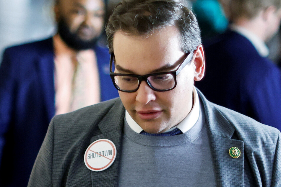 Santos stands accused of hitting unsuspecting donors with tens of thousands of dollars in phony credit card charges.