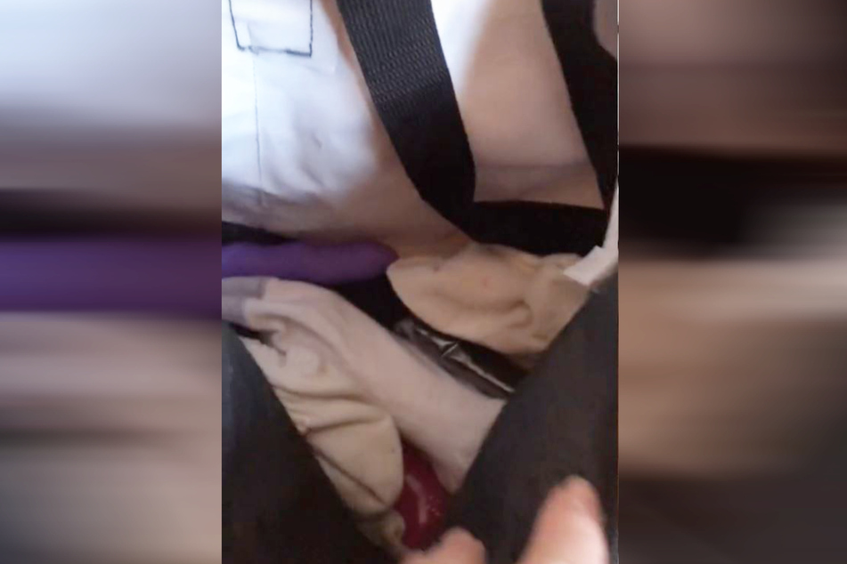 The couple found some spicy sex toys inside the bag.