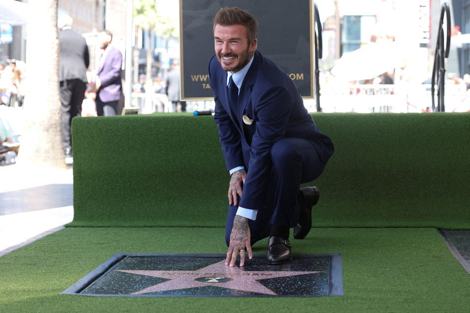 David Beckham is pictured with his star after it was unveiled on the Hollywood Walk of Fame in Los Angeles, California, on June 12, 2026.