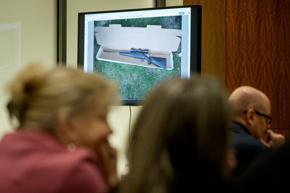 An image of a rifle that prosecutors say was recovered by investigators near Utah Valley University is displayed during a preliminary hearing for Tyler Robinson, who is accused in the fatal shooting of Charlie Kirk, at the Fourth District Courthouse on Thursday, in Provo, Utah.