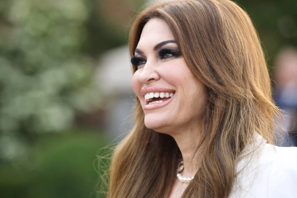 Kimberly Guilfoyle arrives at Trump National Golf Club before a speech by President Donald Trump on June 13, 2023, in Bedminster, New Jersey. Guilfoyle is being accused of begging a MAGA donor to pay off her credit card debt.