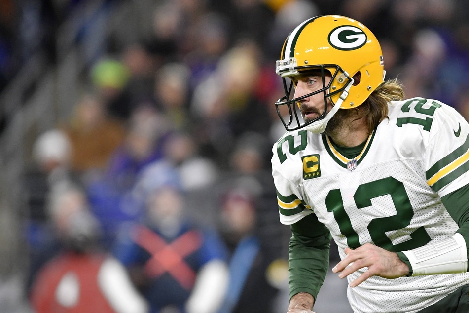 NFL: Rodgers makes history as the Packers outlast the Browns at home