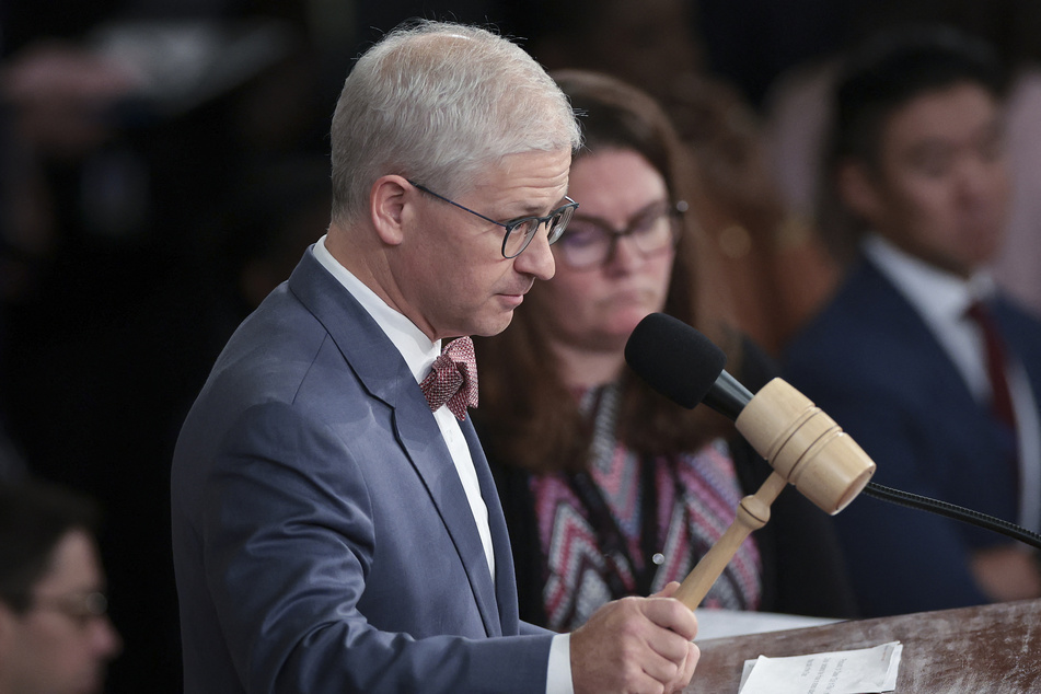 US House of Representatives bicker over how much power to give interim leader Patrick McHenry (pictured).
