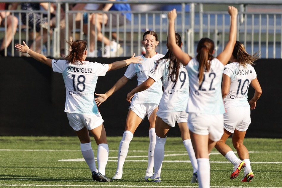 Cece Kizer of the Kansas City Current celebrates after scoring a goal.