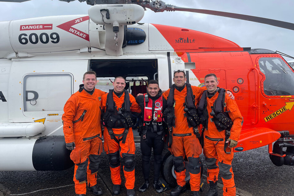 The crew of the helicopter after the successful mission.