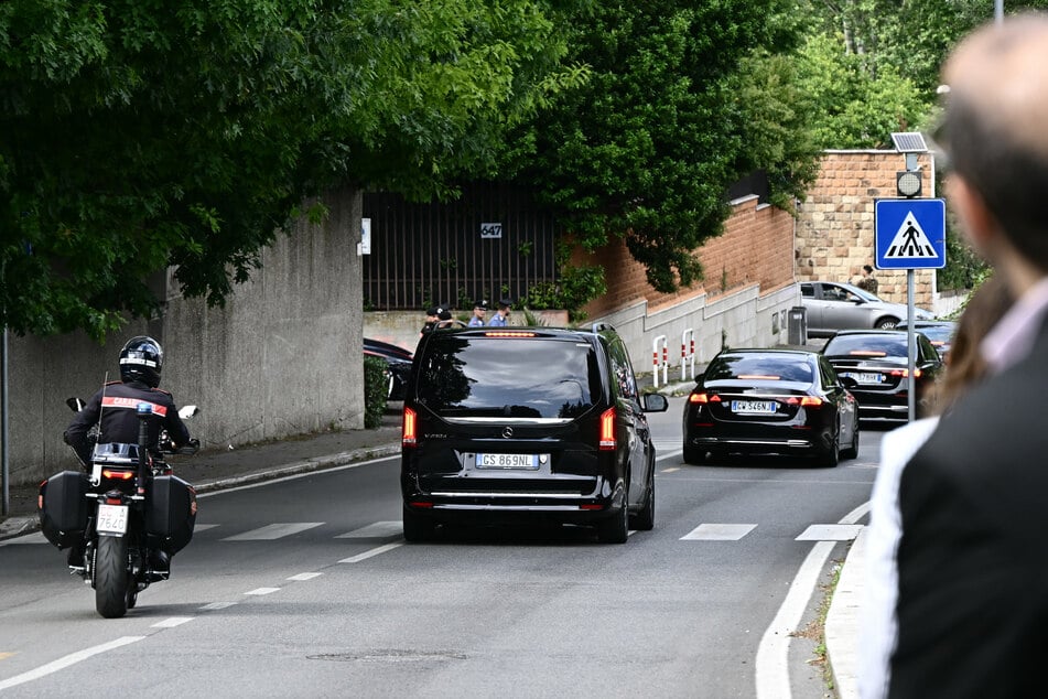 Vehicles of delegations leave the Omani embassy after a fifth round of nuclear talks between Iran and the US, in Rome on Friday.