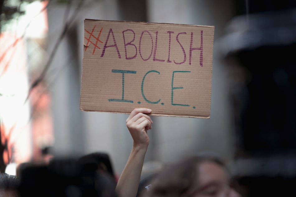 Demonstrators march through downtown Chicago, Illinois, calling for the abolition of US Immigration and Customs Enforcement.