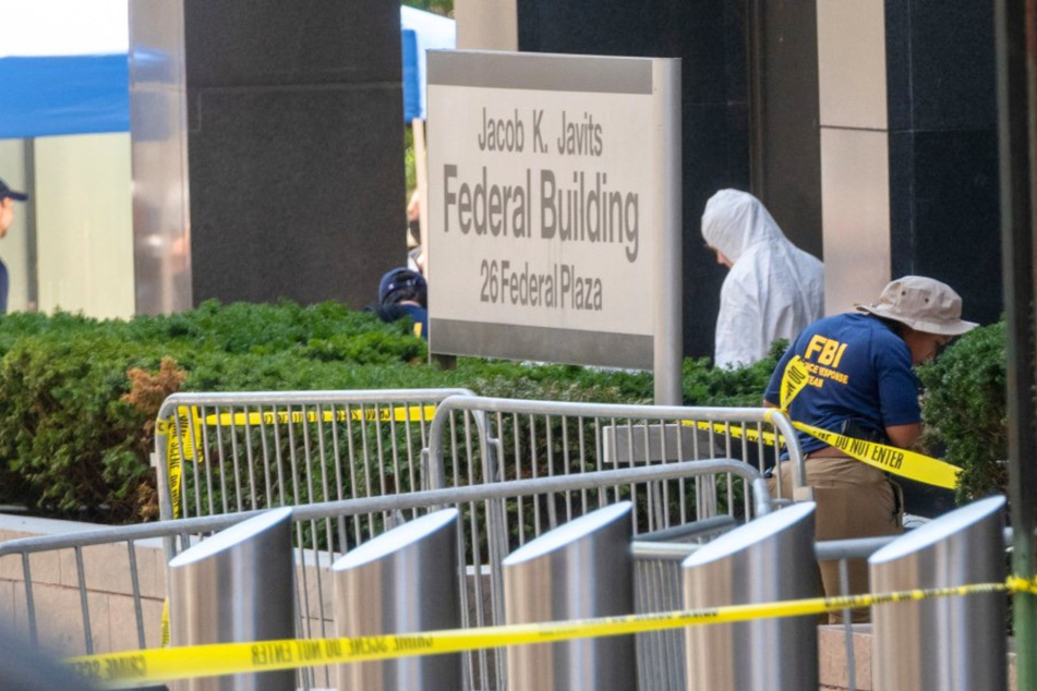 A man was arrested in New York City on Monday after setting a small fire outside of a federal building that houses the city's biggest immigration court.