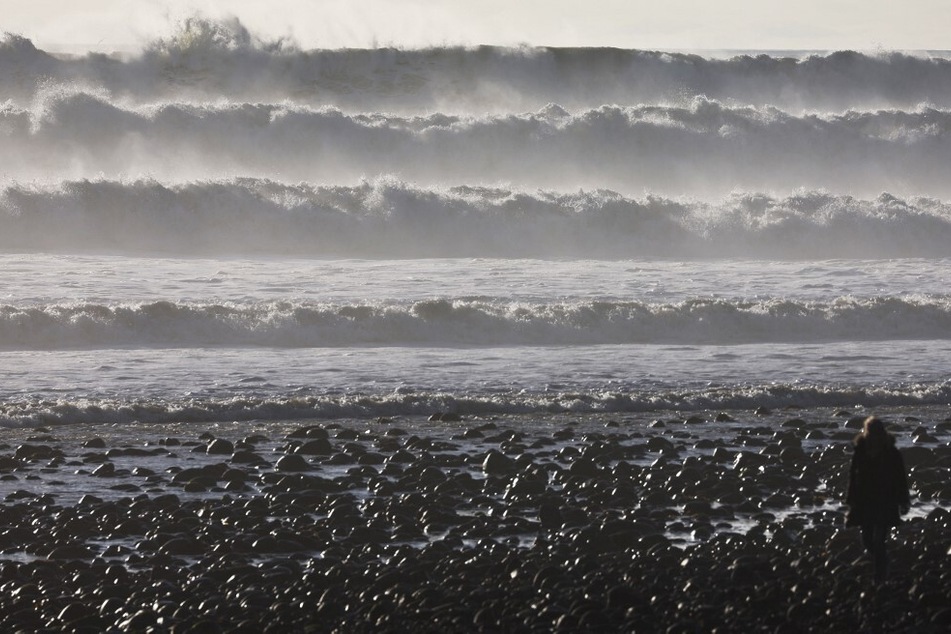 Dangerous surf churned up by storms in the Pacific is impacting much of California’s coastline, with coastal flooding possible in some low-lying areas.