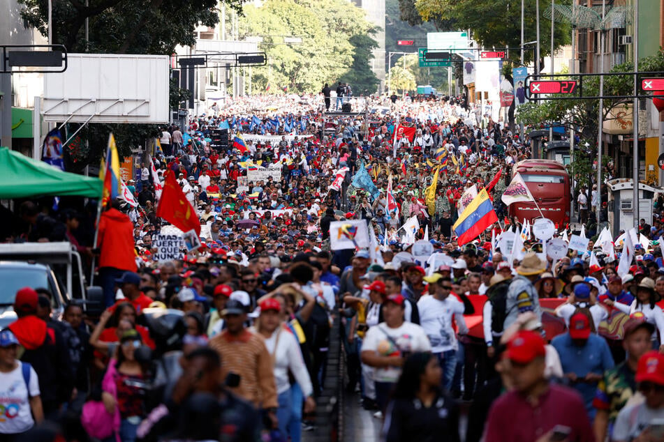 Thousands of Venezuelans marched to demand the freeing of President Nicolas Maduro and his wife, Cilia Flores, from US custody.
