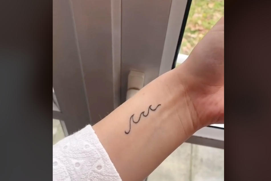 Phoebe was initially excited about her wave tattoo.