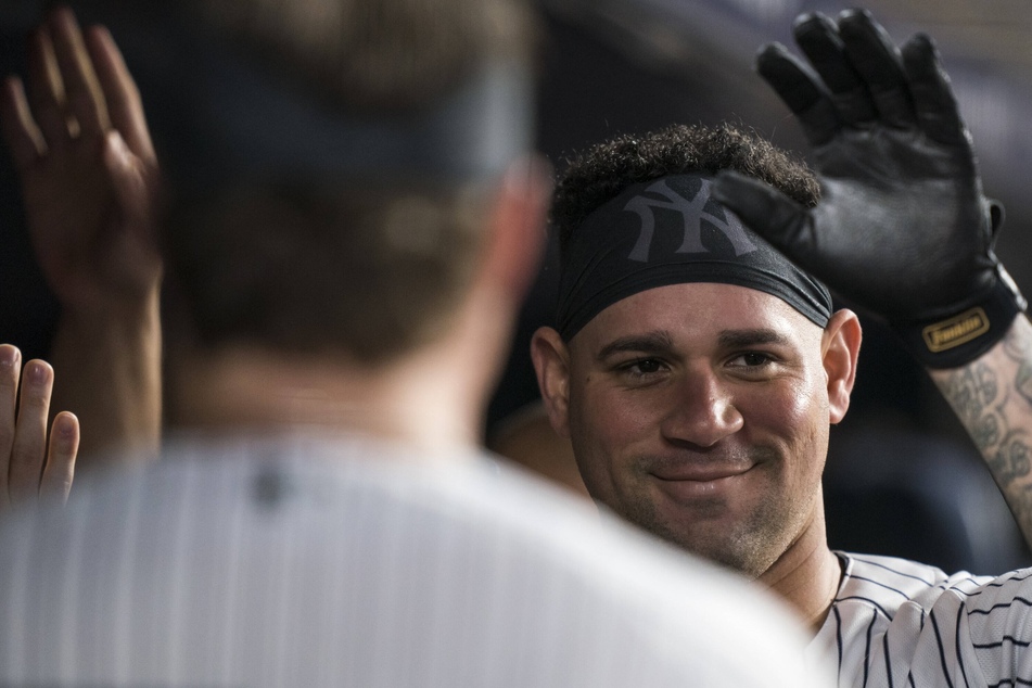 MLB: The Yankees keep their playoff hopes hanging by a thread after outlasting the Rangers